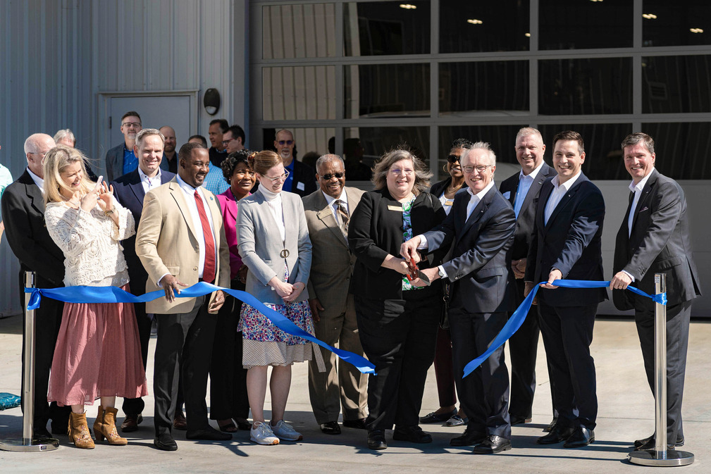 Ceremonial inauguration of the building in Raleigh, North Carolina. Executive Director Dr. Kurt Schmalz and Wake County Commissioner Vickie Adamson, cut the blue ribbon together.